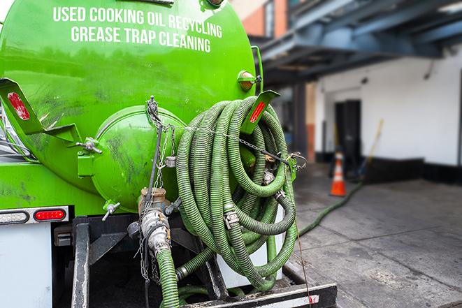 pumping out a heavy-duty grease trap at a restaurant in Amlin